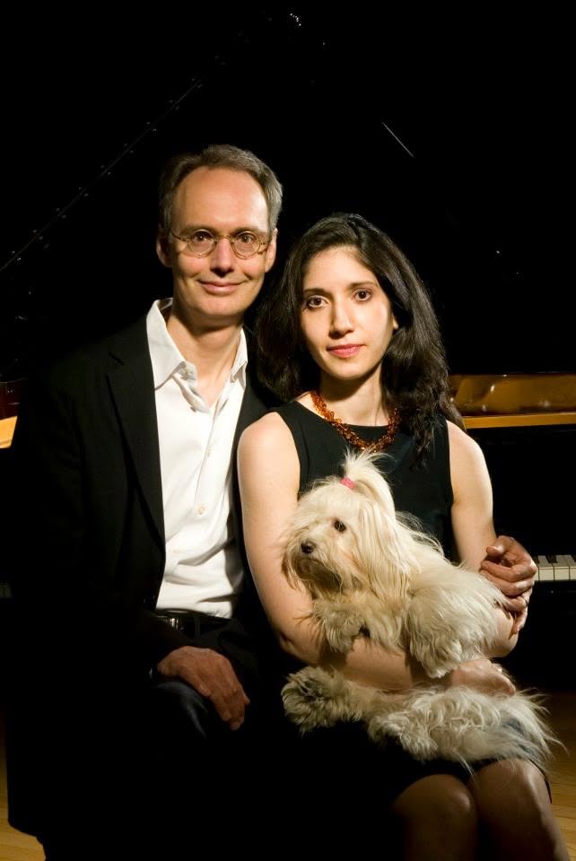 with his wife, Marina Harrison